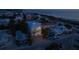 Elevated view of beach house at night, with city lights visible at 105 6Th S St, Bradenton Beach, FL 34217