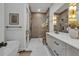 Spa-like bathroom with walk-in shower and double vanity at 105 6Th S St, Bradenton Beach, FL 34217