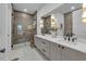 Elegant bathroom with a large walk-in shower and double vanity at 105 6Th S St, Bradenton Beach, FL 34217
