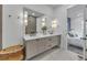 Modern bathroom with a double vanity and elegant tile work at 105 6Th S St, Bradenton Beach, FL 34217