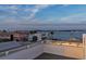 Elevated deck overlooking the bay, boats, and other homes at 105 6Th S St, Bradenton Beach, FL 34217
