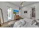 Comfortable bedroom with private balcony and ensuite access at 105 6Th S St, Bradenton Beach, FL 34217
