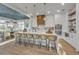 Spacious kitchen with island, stainless steel appliances, and white cabinetry at 105 6Th S St, Bradenton Beach, FL 34217