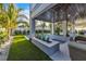 Relaxing pool area with artificial turf and lush landscaping at 105 6Th S St, Bradenton Beach, FL 34217