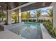 Relaxing pool and patio area, perfect for outdoor entertaining at 105 6Th S St, Bradenton Beach, FL 34217