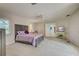 Bedroom with backyard access and private patio views at 1051 Truman St, Nokomis, FL 34275