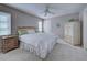 Large bedroom with king-size bed and plenty of storage at 1051 Truman St, Nokomis, FL 34275