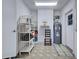 Laundry room with shelving and extra storage at 1051 Truman St, Nokomis, FL 34275