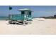 Lifeguard stand on sandy beach with ocean view at 1051 Truman St, Nokomis, FL 34275