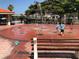 Children playing in a refreshing splash pad at 1051 Truman St, Nokomis, FL 34275