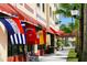 Walkable Venice Avenue, featuring shops and flags at 1051 Truman St, Nokomis, FL 34275