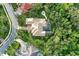 Bird's eye view of house, pool, and surrounding landscape at 11432 Savannah Lakes Dr, Parrish, FL 34219