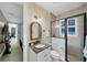Guest bathroom with granite vanity and a shower at 11432 Savannah Lakes Dr, Parrish, FL 34219