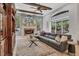 Bright Gathering room featuring a comfortable sectional sofa and pool view at 11432 Savannah Lakes Dr, Parrish, FL 34219