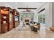 Gathering room with built-in shelving and a cozy fireplace at 11432 Savannah Lakes Dr, Parrish, FL 34219