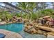Relaxing pool and spa with waterfall feature at 11432 Savannah Lakes Dr, Parrish, FL 34219