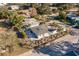 Aerial view of the house and surrounding neighborhood at 120 Edgewater Ter, Dunedin, FL 34698