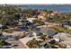Aerial view showcasing a home's waterfront location and neighborhood at 120 Edgewater Ter, Dunedin, FL 34698