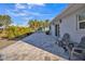 Spacious paved patio with seating area, perfect for outdoor entertaining at 120 Edgewater Ter, Dunedin, FL 34698