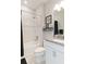 Clean bathroom with a shower/tub combo, white vanity, and gray countertops at 12458 Marsh Pointe Rd, Sarasota, FL 34238