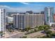 Aerial view of a high-rise building near a marina at 1255 N Gulfstream Ave # 204, Sarasota, FL 34236