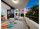 Enjoy sunset views from this furnished balcony with seating area at 1255 N Gulfstream Ave # 204, Sarasota, FL 34236