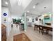 Bright dining room with hardwood floors and access to kitchen and living areas at 1255 N Gulfstream Ave # 204, Sarasota, FL 34236