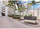 Bay Plaza condo building entrance with landscaping and signage at 1255 N Gulfstream Ave # 204, Sarasota, FL 34236