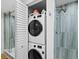 Stackable washer and dryer in a closet at 1255 N Gulfstream Ave # 204, Sarasota, FL 34236