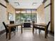 Bright meeting room with tables and chairs, offering water views at 1255 N Gulfstream Ave # 204, Sarasota, FL 34236