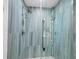 Modern shower with glass enclosure and tiled walls at 1255 N Gulfstream Ave # 204, Sarasota, FL 34236