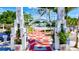 Inviting entrance to Sarasota Bayfront Park with decorative archway, red brick path, and marina views at 130 Riviera Dunes Way # 1104, Palmetto, FL 34221