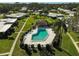 Aerial view of community pool and surrounding homes at 1312 Stafford Ln # 1427, Sarasota, FL 34232