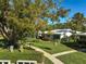 Aerial view showing community landscape and building exteriors at 1312 Stafford Ln # 1427, Sarasota, FL 34232