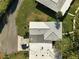 Aerial view of house, driveway, and surrounding landscape at 1312 Stafford Ln # 1427, Sarasota, FL 34232