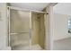 Clean bathroom with a shower/tub combo and tiled walls at 1312 Stafford Ln # 1427, Sarasota, FL 34232