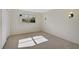 Well-lit bedroom featuring carpet flooring and a closet at 1312 Stafford Ln # 1427, Sarasota, FL 34232