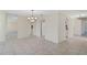 Spacious dining area with tile flooring and mirrored wall at 1312 Stafford Ln # 1427, Sarasota, FL 34232