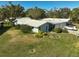 Mid-century modern home with attached garage at 1312 Stafford Ln # 1427, Sarasota, FL 34232