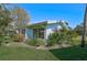Light blue home with nicely landscaped front yard at 1312 Stafford Ln # 1427, Sarasota, FL 34232
