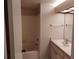 Clean bathroom with shower/tub combo and vanity at 13612 South Village Dr # 105, Tampa, FL 33618