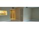 Condo living room with tiled floor and kitchen view at 13612 South Village Dr # 105, Tampa, FL 33618