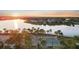 Community features a lake, basketball court and sunset views at 14339 Easy Goer St, Ruskin, FL 33573