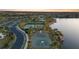 Community boasts tennis courts, basketball court and lake access at 14339 Easy Goer St, Ruskin, FL 33573