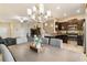 Open concept dining room with a view of the kitchen and living room at 14339 Easy Goer St, Ruskin, FL 33573