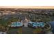 Community pool with surrounding lounge area and gazebo at 14339 Easy Goer St, Ruskin, FL 33573