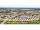 Expansive aerial view of a residential community with numerous homes and waterways at 150 Mestre Pl, North Venice, FL 34275