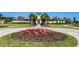 Community clubhouse with landscaped grounds and inviting entrance at 15404 Trinity Fall Way, Bradenton, FL 34212