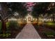 Attractive community entrance with brick path and landscaping at 15404 Trinity Fall Way, Bradenton, FL 34212