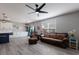 Open living space with kitchen, living area, and sliding glass doors at 15404 Trinity Fall Way, Bradenton, FL 34212